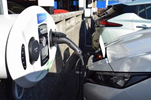 Car electric vehicle charging at public wallbox unit