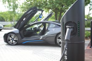 BMW i8 at Chargemaster public electric charging fastpost in a town centre
