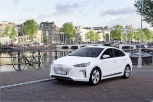 Hyundai Ioniq hybrid plug in electric vehicle by a canal