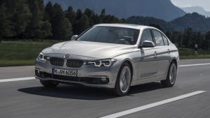 BMW 330e electric vehicle on the road