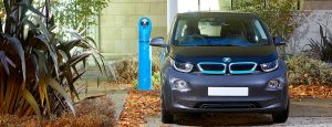 BMW i3 charging at blue fastpost public charge point unit