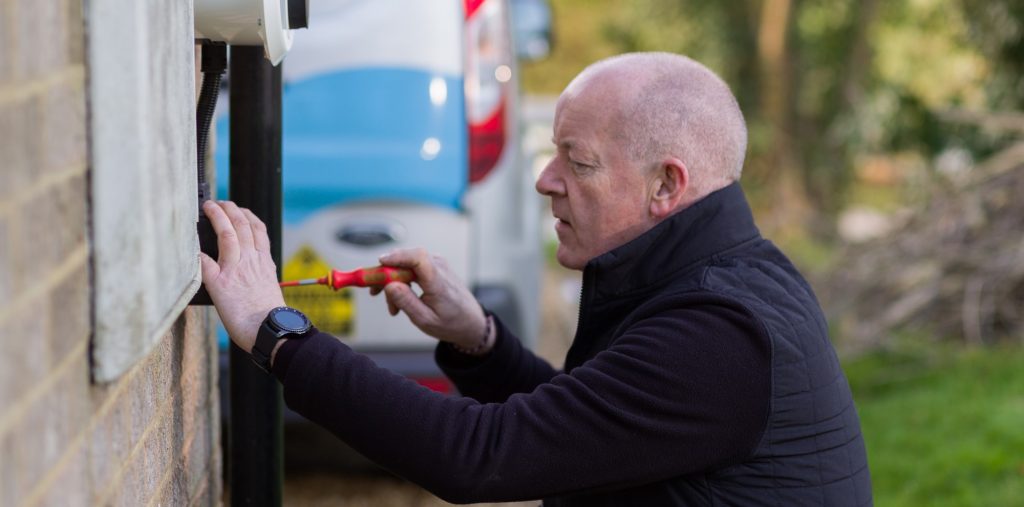 BP Chargemaster electrician installing a socketed Homecharge unit